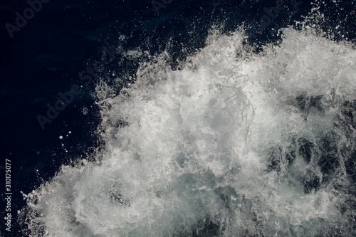 Fototapeta Naklejka Na Ścianę i Meble -  Stormy sea texture. White Sea foam. Spray water.