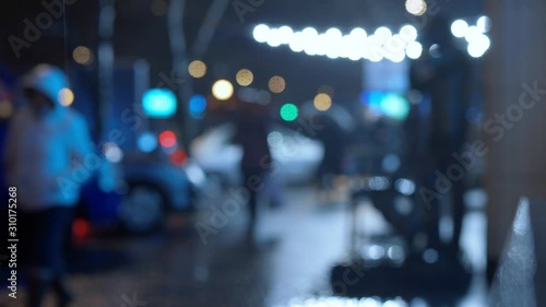 Wallpaper Mural blurred footage of Crowd Of People Walking Street City At rainy winter Night, 4k stock footage Torontodigital.ca