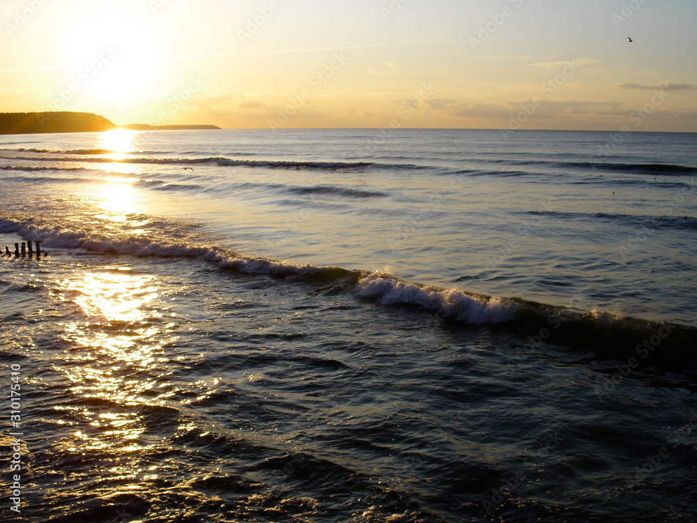Obraz premium Sunset by the sea
