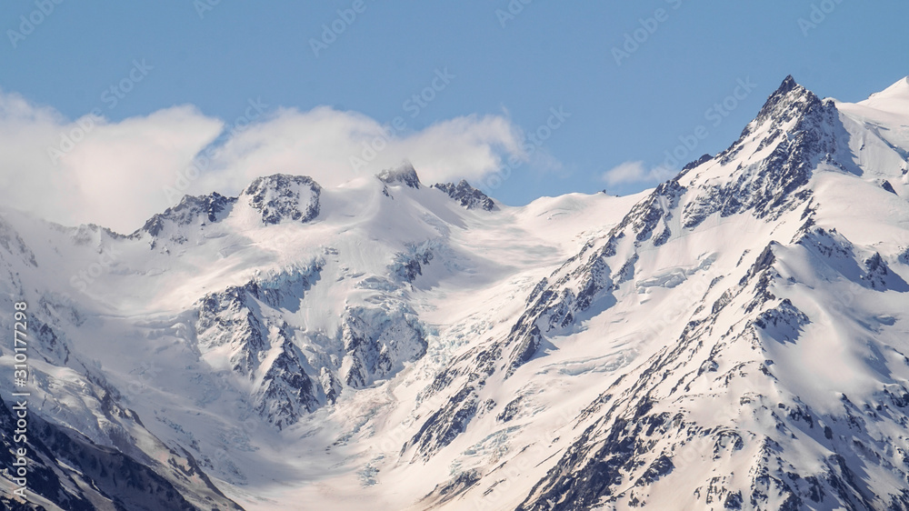 Glacier Lake View with background of snowy Mount Cook on a sunny day