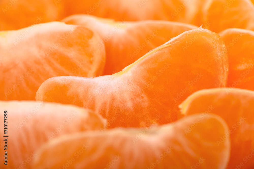 Pieces of fresh, tasty tangerine or mandarin fruit Pieces of fresh, tasty tangerine or mandarin fruit