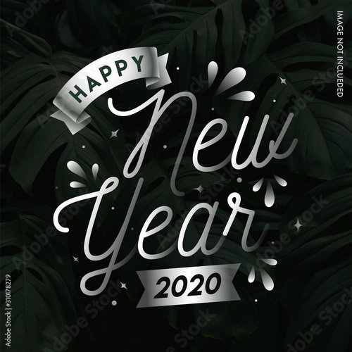 Silver Happy New Year 2020 Text on Tropical Leaves Black Background.