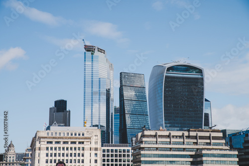 Wallpaper Mural London, England - The bank district of central London with famous skyscrapers and other landmarks at sunset with grey sky - UK Torontodigital.ca