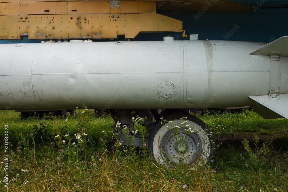 Suspended fuel tank on a military aircraft. Design elements and details of the old Soviet jet bomber. Suspended fuel tank on a military aircraft. Design elements and details of the old Soviet jet bomber.