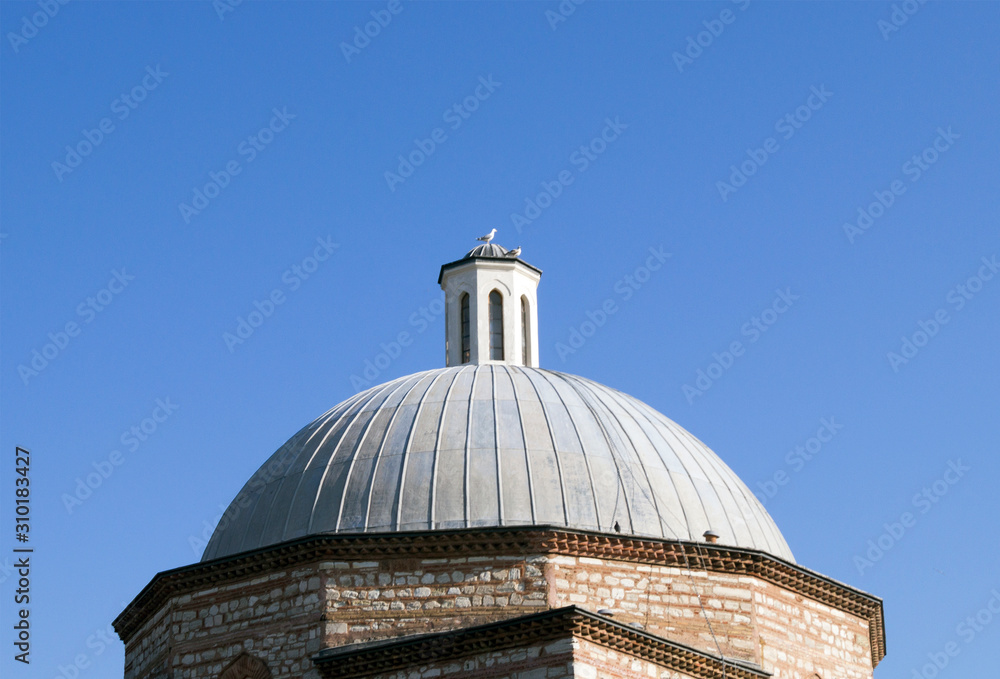 the roof of the ancient mosque against the sky the roof of the ancient mosque against the sky