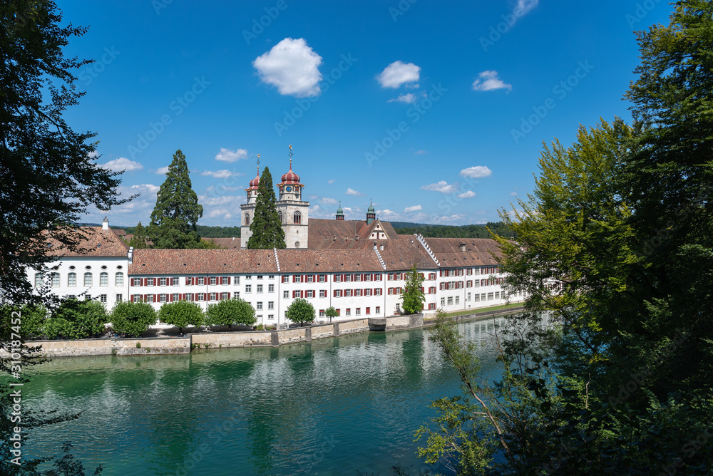 Rhine with monastery Rheinau in Switzerland