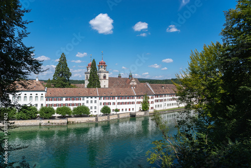 Rhine with monastery Rheinau in Switzerland