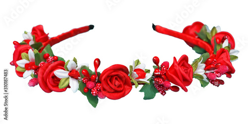 A wreath of red roses. Folk hat made of flowers. Hair ornament red and beige