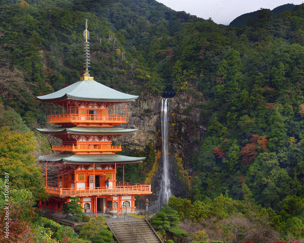 Wakayama, Japan - November 23, 2019: Beautiful view of Nachisan Seigantoji temple and Nachi no Taki waterfall at Nachi Katsuura Town Wakayama, Japan - November 23, 2019: Beautiful view of Nachisan Seigantoji temple and Nachi no Taki waterfall at Nachi Katsuura Town