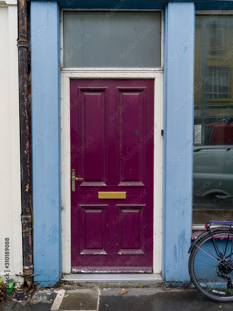 View of a magenta color door, Ennistimon, County Clare, Ireland