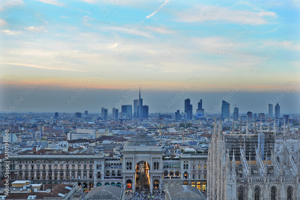 Italy , Milan december 17,2019 - Amazing panoramic aerial view of downtown of the city - Duomo Cathedral , Vittorio Emanuele Gallery and Skyline 