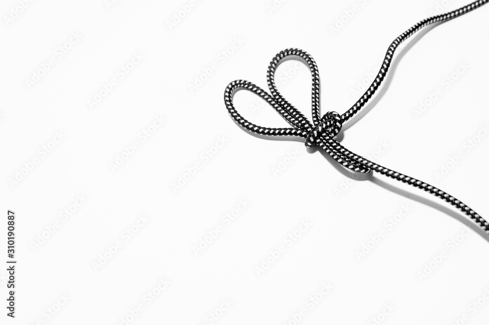 A bunny ears knot on white background A bunny ears knot on white background