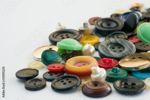 corner of colored buttons on a white background