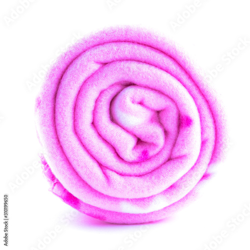 rolled up pink colorful fleece blankets close up