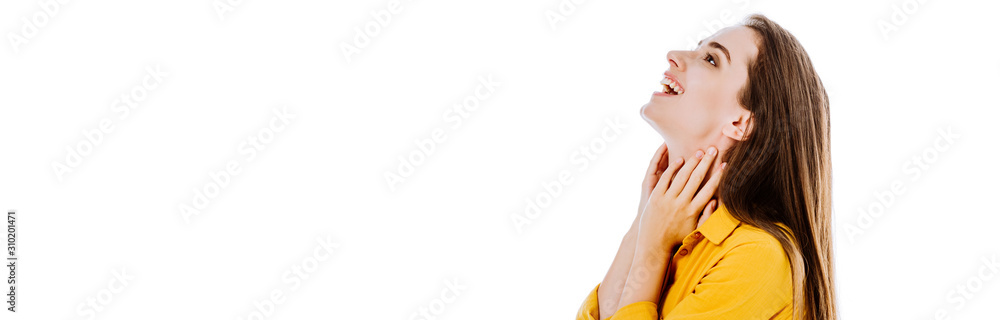 side view of happy attractive girl touching neck isolated on white, panoramic shot side view of happy attractive girl touching neck isolated on white, panoramic shot