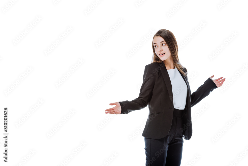 smiling businesswoman in suit looking away with open arms isolated on white smiling businesswoman in suit looking away with open arms isolated on white