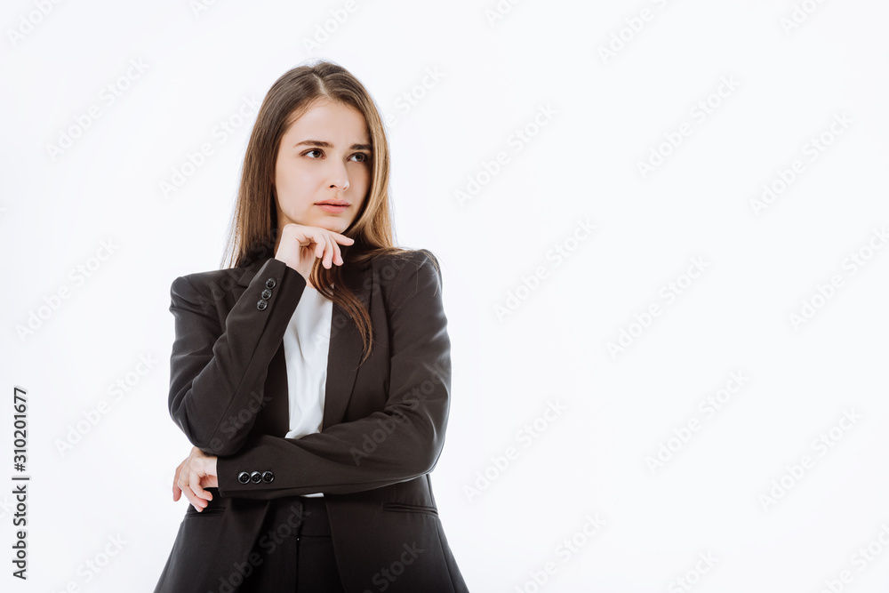 thoughtful businesswoman in suit looking away isolated on white thoughtful businesswoman in suit looking away isolated on white