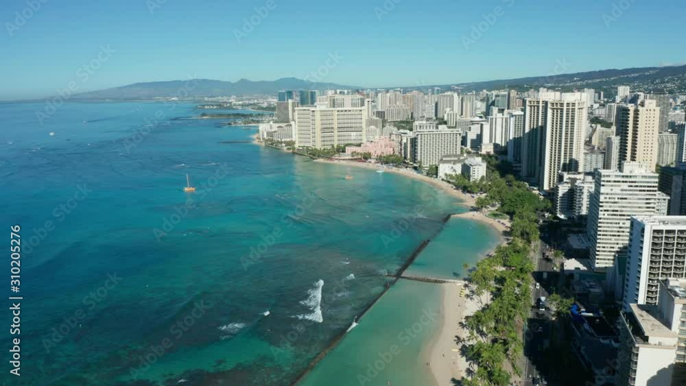 high flying backward over Honolulu's iconic Waikiki beach high flying backward over Honolulu's iconic Waikiki beach