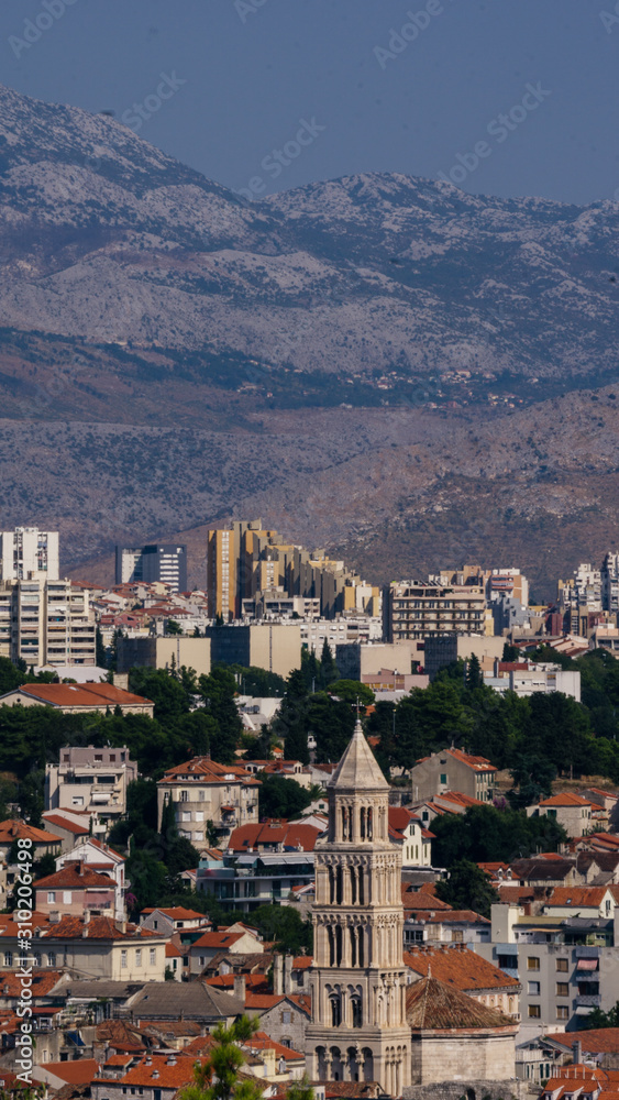 City skyline of Split Croatia with mountains in distance