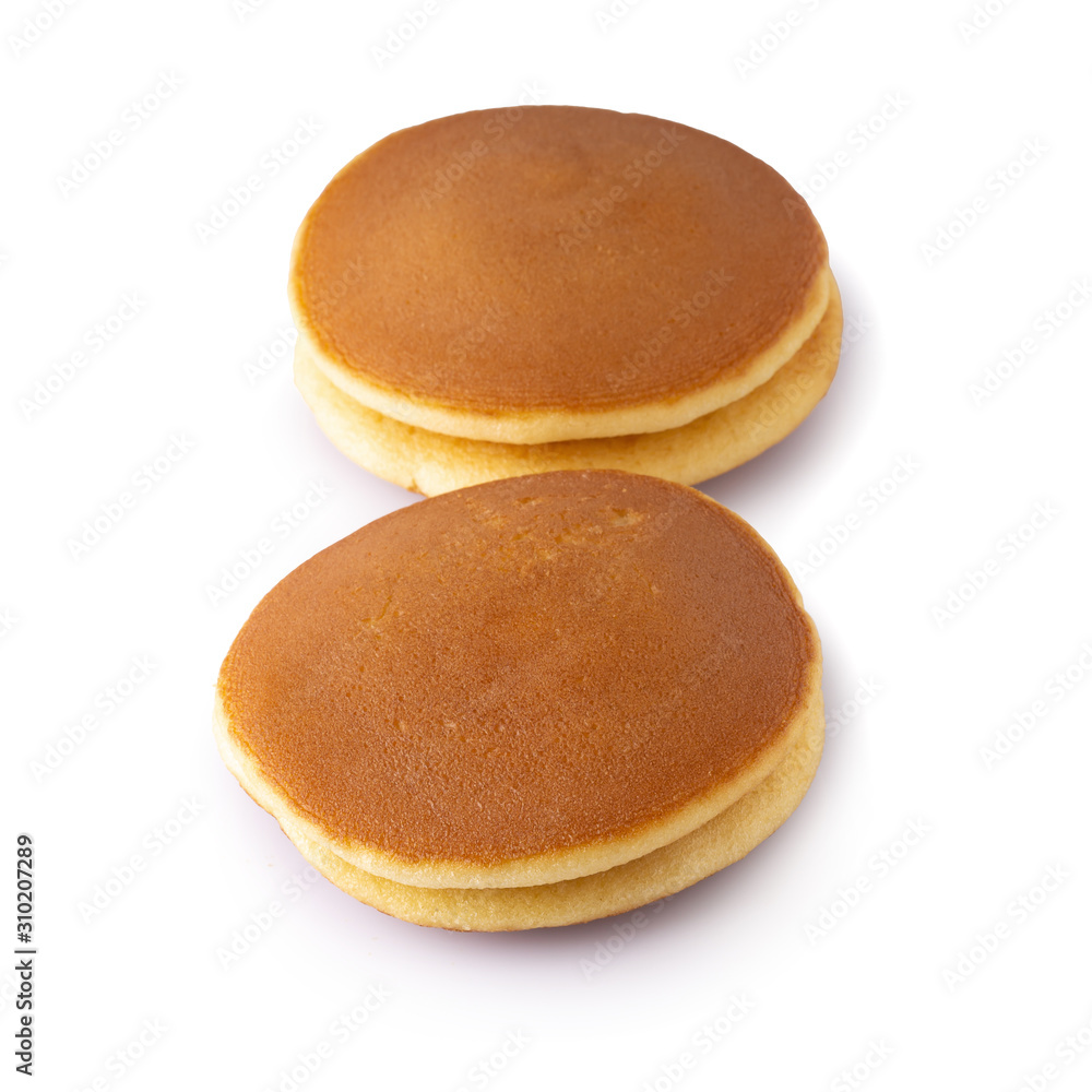 Dorayaki is japanese pancakes isolated on white background. Dorayaki is japanese pancakes isolated on white background.