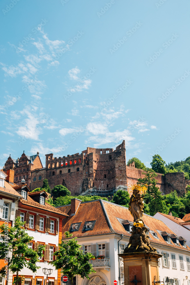 Old town Kornmarkt square and Heidelberg castle in Heidelberg, Germany