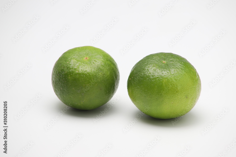 Fresh green lime isolated on white background Fresh green lime isolated on white background