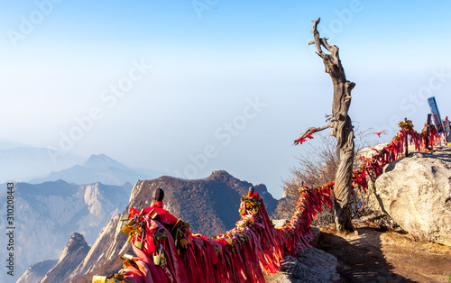 Red ribbons padlocks on Huashan Mountain