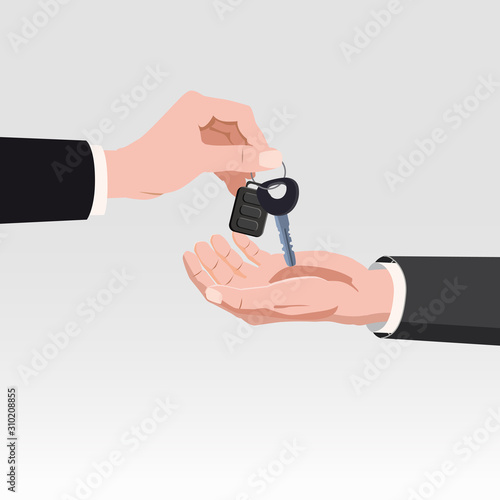 Hand giving car keys with alarm system. Car rental or sale concept