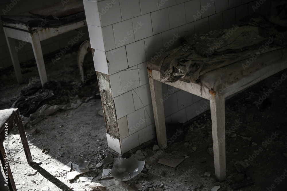 hazard empty abandoned hospital concept with bed and broken glass in war zone or technogenic accident or chemical attack hazard empty abandoned hospital concept with bed and broken glass in war zone or technogenic accident or chemical attack