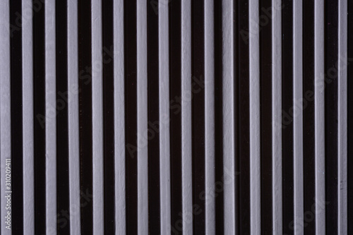 background of dark and light stripes arranged vertically