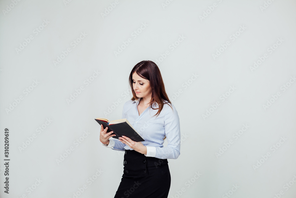 woman reading a book business style office woman reading a book business style office
