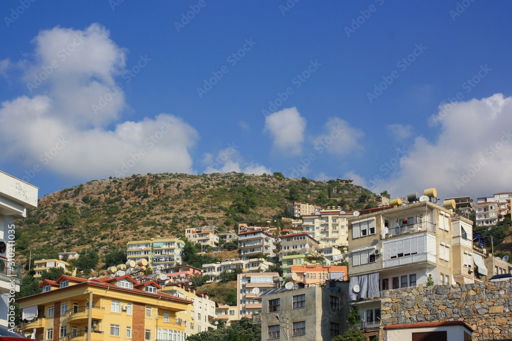 view of the city at the foot of the mountain