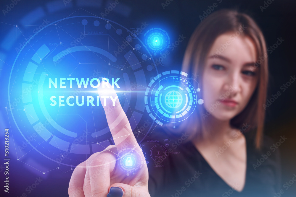 Business, Technology, Internet and network concept. Young businessman working on a virtual screen of the future and sees the inscription: Business, Technology, Internet and network concept. Young businessman working on a virtual screen of the future and sees the inscription: