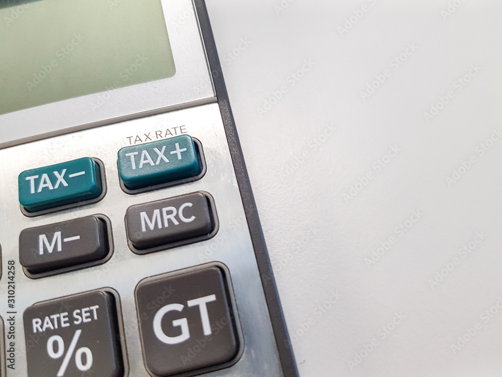 Blurred selective focus, Cost reduction calculating on financial, tax and business with coin, money and pencil. Tax and expense cost saving for personal and enterprise corporate concept. Blurred selective focus, Cost reduction calculating on financial, tax and business with coin, money and pencil. Tax and expense cost saving for personal and enterprise corporate concept.