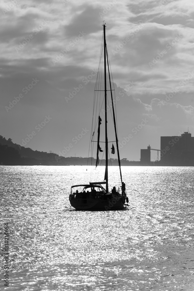 Silhouette of sailboat in river, Santa Maria de Belem, Lisbon, Portugal