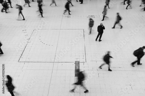 Rushing commuters at Waterloo station.