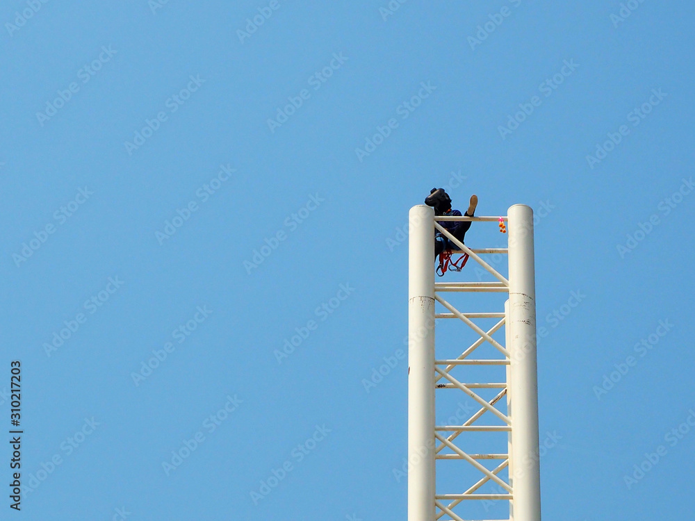 Man working on the Working at height in construction site Man working on the Working at height in construction site