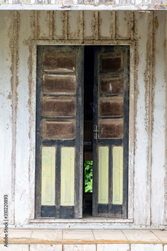 old wooden door in wall