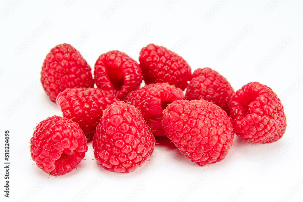 bunch of raspberries on a white background bunch of raspberries on a white background