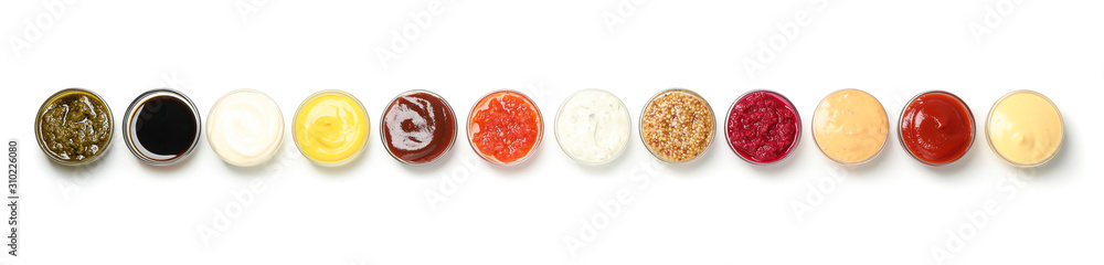 Set of tasty sauces in bowls isolated on white background Set of tasty sauces in bowls isolated on white background