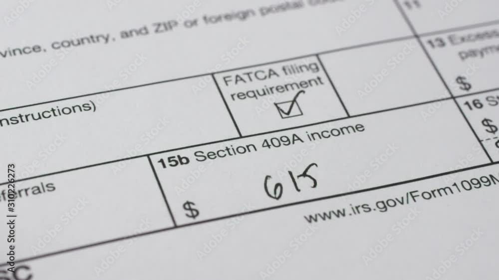 Tax reporting. Human fills out the 1099-misc tax form. Macro video Tax reporting. Human fills out the 1099-misc tax form. Macro video