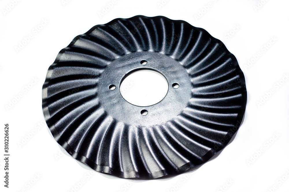 Disc harrows for tractor for soil treatment, black shot on a white background Disc harrows for tractor for soil treatment, black shot on a white background