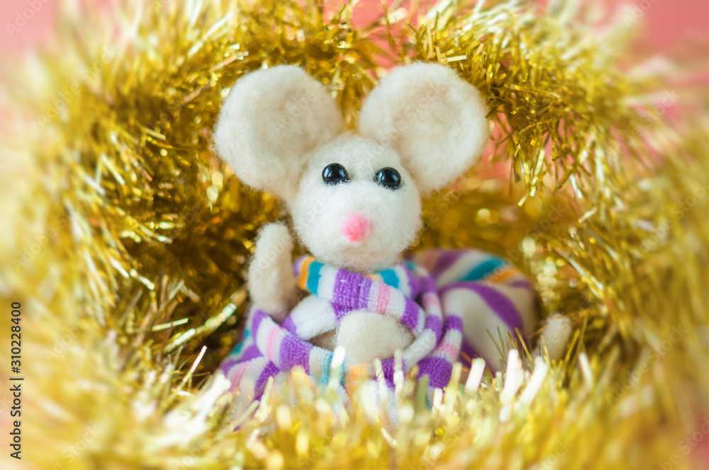 handmade white mouse symbol of the new year surrounded by tinsel and sparkle handmade white mouse symbol of the new year surrounded by tinsel and sparkle