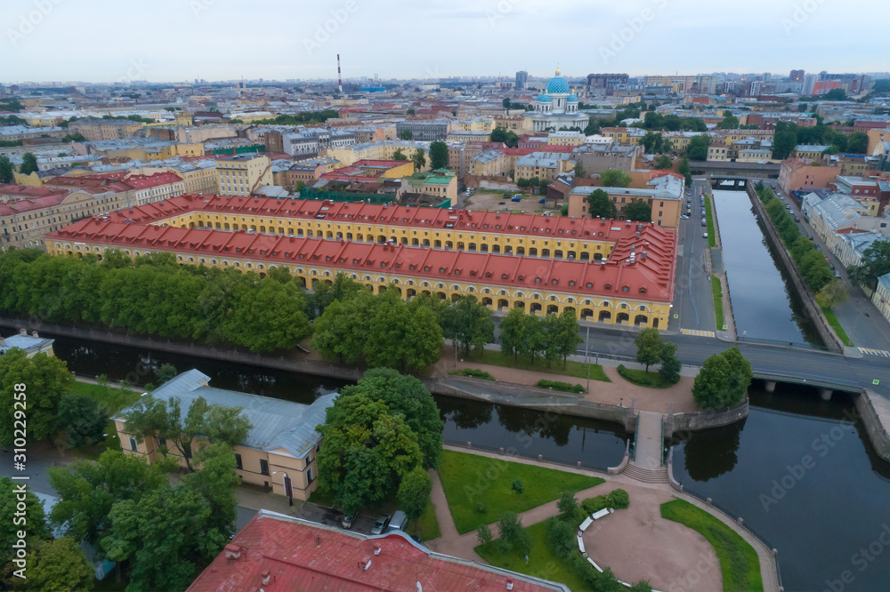Aerial view of the old building of the Nikolsky Market (1789) on a cloudy August morning (aerial photography). Saint-Petersburg, Russia