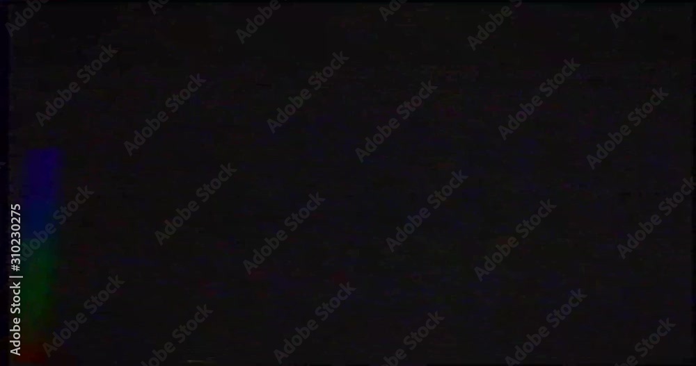 Old VHS Glitches and Static Noise on the black Background. TV Noise Footage, analog signal with bad interference Old VHS Glitches and Static Noise on the black Background. TV Noise Footage, analog signal with bad interference