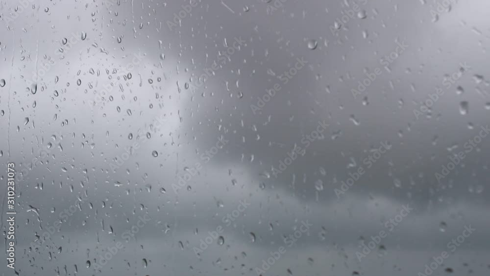 rain drops on window, dark stormy weather rain drops on window, dark stormy weather