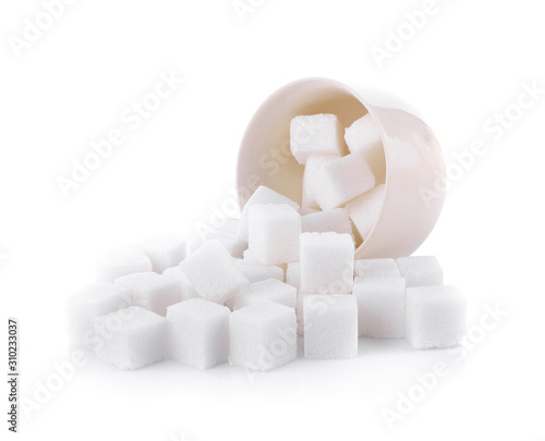 Sugar cubes in a bowl isolated on white background