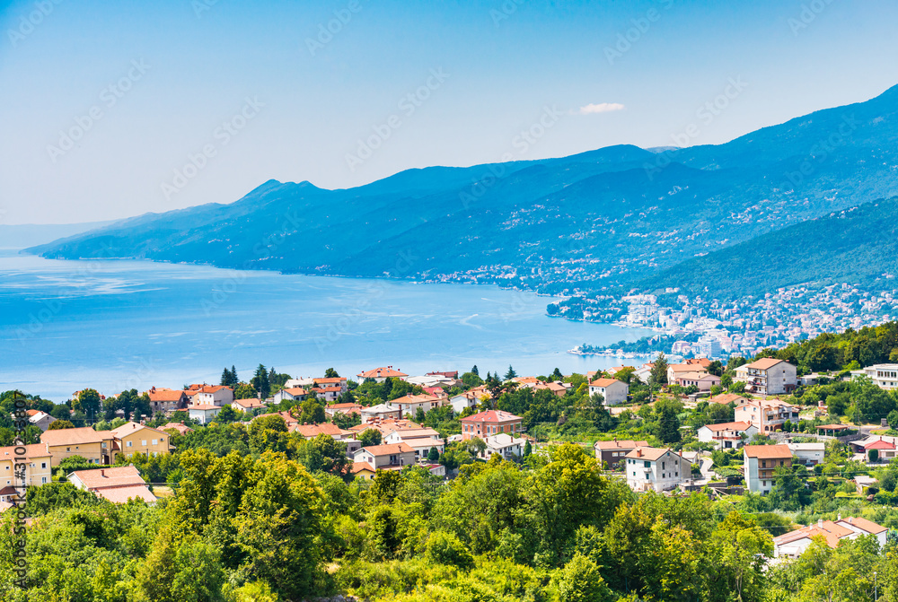 Opatija riviera and Kvarner bay view from above with hills and blue water in Croatia