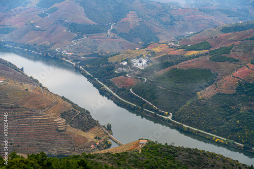 Aerial view of river passing through valley, Sao Leonardo De Galafura, Peso da R�gua, Vila Real, Douro Valley, Portugal photo