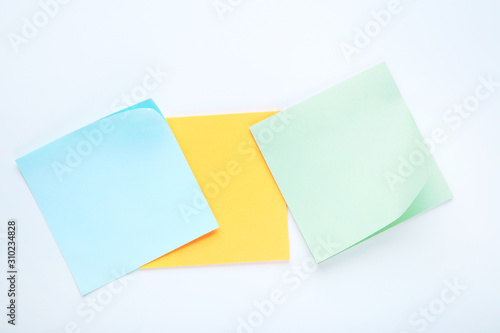 Paper sticky notes on white background